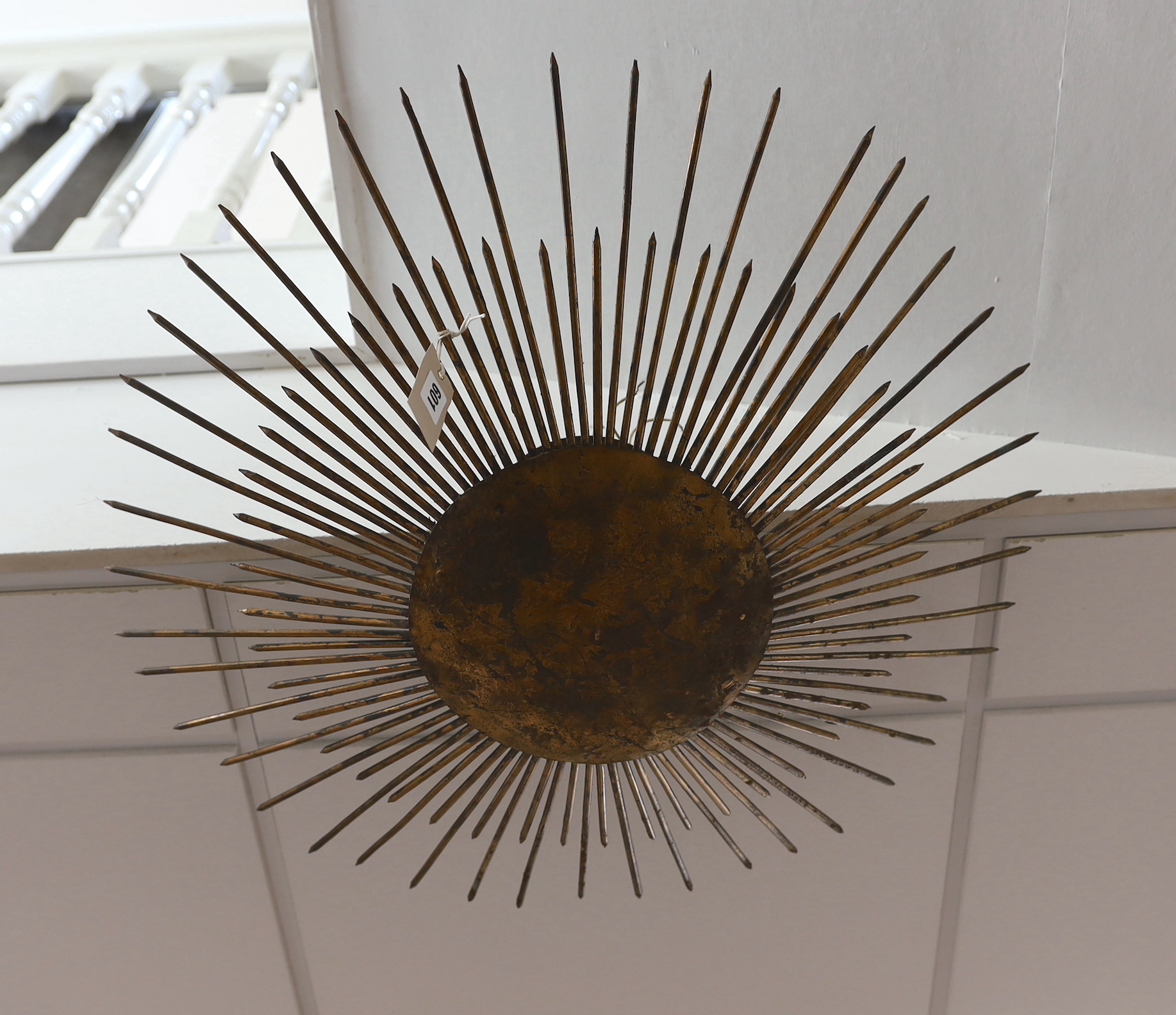 A sunburst light fitting, 67cm diameter